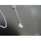 Stříbrný náhrdelník s křížkem naležato
